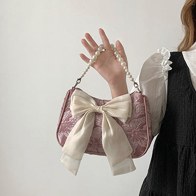 Bow Shoulder Canvas Bag with Pearl Strap Design